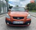 Оранжевый Киа Рио, объемом двигателя 1.4 л и пробегом 233 тыс. км за 3650 $, фото 2 на Automoto.ua