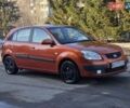 Оранжевый Киа Рио, объемом двигателя 1.4 л и пробегом 232 тыс. км за 3999 $, фото 1 на Automoto.ua