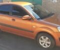 Помаранчевий Кіа Ріо, об'ємом двигуна 1.4 л та пробігом 164 тис. км за 5600 $, фото 3 на Automoto.ua