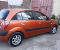 Оранжевый Киа Рио, объемом двигателя 1.4 л и пробегом 234 тыс. км за 3850 $, фото 3 на Automoto.ua