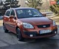 Оранжевый Киа Рио, объемом двигателя 1.4 л и пробегом 232 тыс. км за 3999 $, фото 1 на Automoto.ua