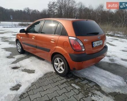 Помаранчевий Кіа Ріо, об'ємом двигуна 1.4 л та пробігом 210 тис. км за 4500 $, фото 4 на Automoto.ua