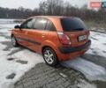 Помаранчевий Кіа Ріо, об'ємом двигуна 1.4 л та пробігом 210 тис. км за 4500 $, фото 4 на Automoto.ua