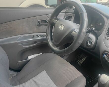 Оранжевый Киа Рио, объемом двигателя 1.4 л и пробегом 235 тыс. км за 5000 $, фото 6 на Automoto.ua