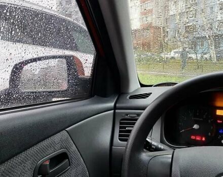 Оранжевый Киа Рио, объемом двигателя 1.4 л и пробегом 165 тыс. км за 4500 $, фото 8 на Automoto.ua