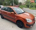 Оранжевый Киа Рио, объемом двигателя 1.4 л и пробегом 234 тыс. км за 3850 $, фото 1 на Automoto.ua
