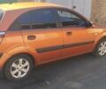 Помаранчевий Кіа Ріо, об'ємом двигуна 1.4 л та пробігом 164 тис. км за 5600 $, фото 5 на Automoto.ua