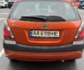 Оранжевый Киа Рио, объемом двигателя 1.4 л и пробегом 247 тыс. км за 3800 $, фото 6 на Automoto.ua