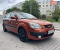Оранжевый Киа Рио, объемом двигателя 1.4 л и пробегом 233 тыс. км за 3650 $, фото 3 на Automoto.ua