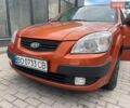 Оранжевый Киа Рио, объемом двигателя 1.4 л и пробегом 234 тыс. км за 3850 $, фото 4 на Automoto.ua