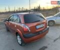 Оранжевый Киа Рио, объемом двигателя 1.4 л и пробегом 277 тыс. км за 4100 $, фото 1 на Automoto.ua