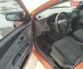 Помаранчевий Кіа Ріо, об'ємом двигуна 1.4 л та пробігом 210 тис. км за 4500 $, фото 6 на Automoto.ua