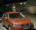 Оранжевый Киа Рио, объемом двигателя 1.4 л и пробегом 208 тыс. км за 4813 $, фото 2 на Automoto.ua