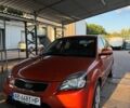 Оранжевый Киа Рио, объемом двигателя 1.4 л и пробегом 210 тыс. км за 4600 $, фото 1 на Automoto.ua