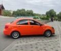 Помаранчевий Кіа Ріо, об'ємом двигуна 1.4 л та пробігом 235 тис. км за 4100 $, фото 4 на Automoto.ua