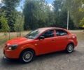 Оранжевый Киа Рио, объемом двигателя 1.4 л и пробегом 235 тыс. км за 4100 $, фото 5 на Automoto.ua