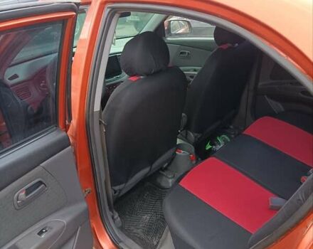 Оранжевый Киа Рио, объемом двигателя 1.4 л и пробегом 241 тыс. км за 5000 $, фото 7 на Automoto.ua