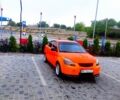 Помаранчевий Кіа Ріо, об'ємом двигуна 1.4 л та пробігом 235 тис. км за 4100 $, фото 3 на Automoto.ua