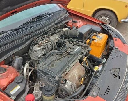 Оранжевый Киа Рио, объемом двигателя 1.4 л и пробегом 241 тыс. км за 5000 $, фото 9 на Automoto.ua