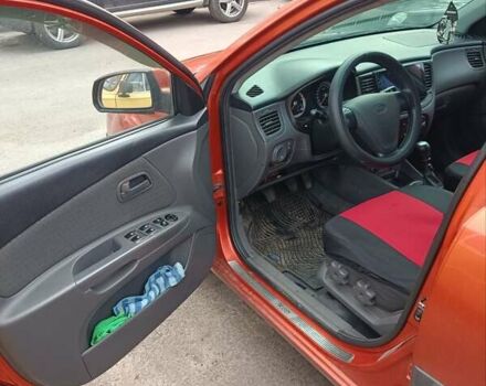 Оранжевый Киа Рио, объемом двигателя 1.4 л и пробегом 241 тыс. км за 5000 $, фото 6 на Automoto.ua
