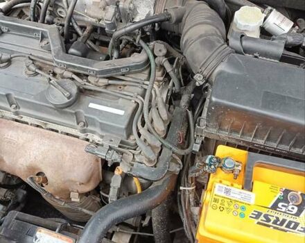 Оранжевый Киа Рио, объемом двигателя 1.4 л и пробегом 241 тыс. км за 5000 $, фото 10 на Automoto.ua