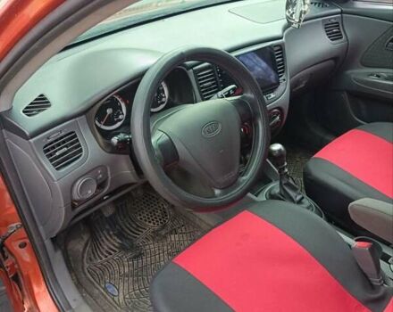 Оранжевый Киа Рио, объемом двигателя 1.4 л и пробегом 241 тыс. км за 5000 $, фото 5 на Automoto.ua