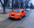 Помаранчевий Кіа Ріо, об'ємом двигуна 1.4 л та пробігом 235 тис. км за 4100 $, фото 1 на Automoto.ua