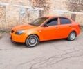 Помаранчевий Кіа Ріо, об'ємом двигуна 1.4 л та пробігом 235 тис. км за 4100 $, фото 1 на Automoto.ua