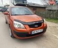 Помаранчевий Кіа Ріо, об'ємом двигуна 1.4 л та пробігом 151 тис. км за 3950 $, фото 1 на Automoto.ua