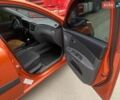 Помаранчевий Кіа Ріо, об'ємом двигуна 1.4 л та пробігом 151 тис. км за 3950 $, фото 5 на Automoto.ua