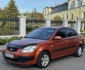 Помаранчевий Кіа Ріо, об'ємом двигуна 1.4 л та пробігом 152 тис. км за 4651 $, фото 1 на Automoto.ua