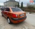 Помаранчевий Кіа Ріо, об'ємом двигуна 1.4 л та пробігом 151 тис. км за 3950 $, фото 3 на Automoto.ua