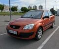 Помаранчевий Кіа Ріо, об'ємом двигуна 1.4 л та пробігом 124 тис. км за 4500 $, фото 1 на Automoto.ua
