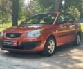 Оранжевый Киа Рио, объемом двигателя 1.4 л и пробегом 124 тыс. км за 4340 $, фото 1 на Automoto.ua
