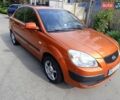 Помаранчевий Кіа Ріо, об'ємом двигуна 1.4 л та пробігом 138 тис. км за 4600 $, фото 1 на Automoto.ua