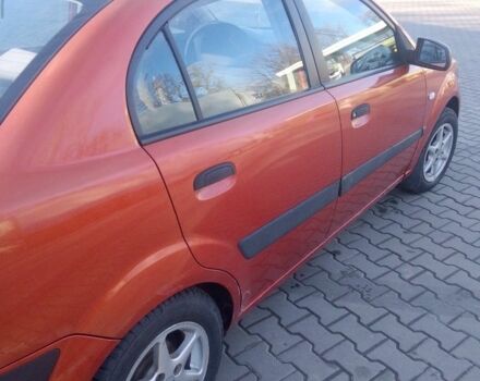 Оранжевый Киа Рио, объемом двигателя 1.4 л и пробегом 447 тыс. км за 4200 $, фото 6 на Automoto.ua