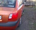 Помаранчевий Кіа Ріо, об'ємом двигуна 1.4 л та пробігом 447 тис. км за 3900 $, фото 2 на Automoto.ua