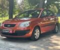 Оранжевый Киа Рио, объемом двигателя 1.4 л и пробегом 124 тыс. км за 4390 $, фото 1 на Automoto.ua