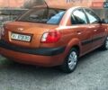 Оранжевый Киа Рио, объемом двигателя 1.4 л и пробегом 430 тыс. км за 3250 $, фото 1 на Automoto.ua