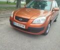 Помаранчевий Кіа Ріо, об'ємом двигуна 1.49 л та пробігом 169 тис. км за 4700 $, фото 1 на Automoto.ua