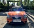 Оранжевый Киа Рио, объемом двигателя 1.4 л и пробегом 160 тыс. км за 4999 $, фото 2 на Automoto.ua