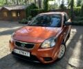 Оранжевый Киа Рио, объемом двигателя 1.4 л и пробегом 160 тыс. км за 4999 $, фото 1 на Automoto.ua