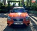 Оранжевый Киа Рио, объемом двигателя 1.4 л и пробегом 160 тыс. км за 5100 $, фото 3 на Automoto.ua