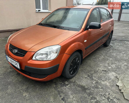 Оранжевый Киа Рио, объемом двигателя 1.4 л и пробегом 150 тыс. км за 4200 $, фото 1 на Automoto.ua