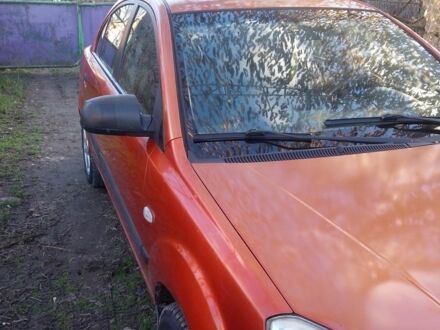 Помаранчевий Кіа Ріо, об'ємом двигуна 1.4 л та пробігом 447 тис. км за 3900 $, фото 1 на Automoto.ua
