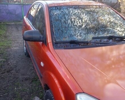 Оранжевый Киа Рио, объемом двигателя 1.4 л и пробегом 447 тыс. км за 4200 $, фото 1 на Automoto.ua