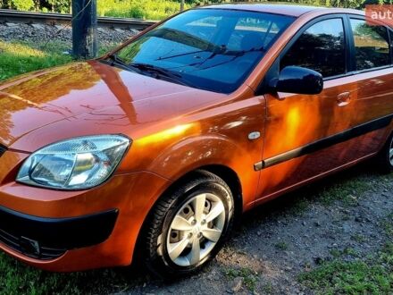 Оранжевый Киа Рио, объемом двигателя 1.4 л и пробегом 249 тыс. км за 5500 $, фото 1 на Automoto.ua