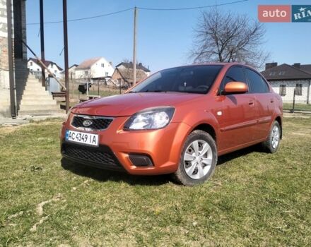 Оранжевый Киа Рио, объемом двигателя 1.4 л и пробегом 125 тыс. км за 5000 $, фото 1 на Automoto.ua