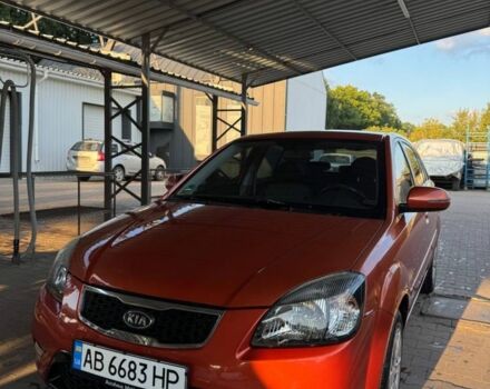 Оранжевый Киа Рио, объемом двигателя 1.4 л и пробегом 208 тыс. км за 5200 $, фото 1 на Automoto.ua