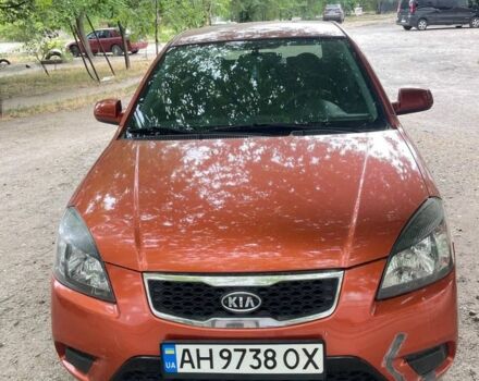 Помаранчевий Кіа Ріо, об'ємом двигуна 1.4 л та пробігом 115 тис. км за 3604 $, фото 1 на Automoto.ua